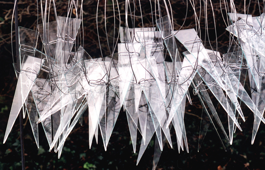 Suspended glass tips